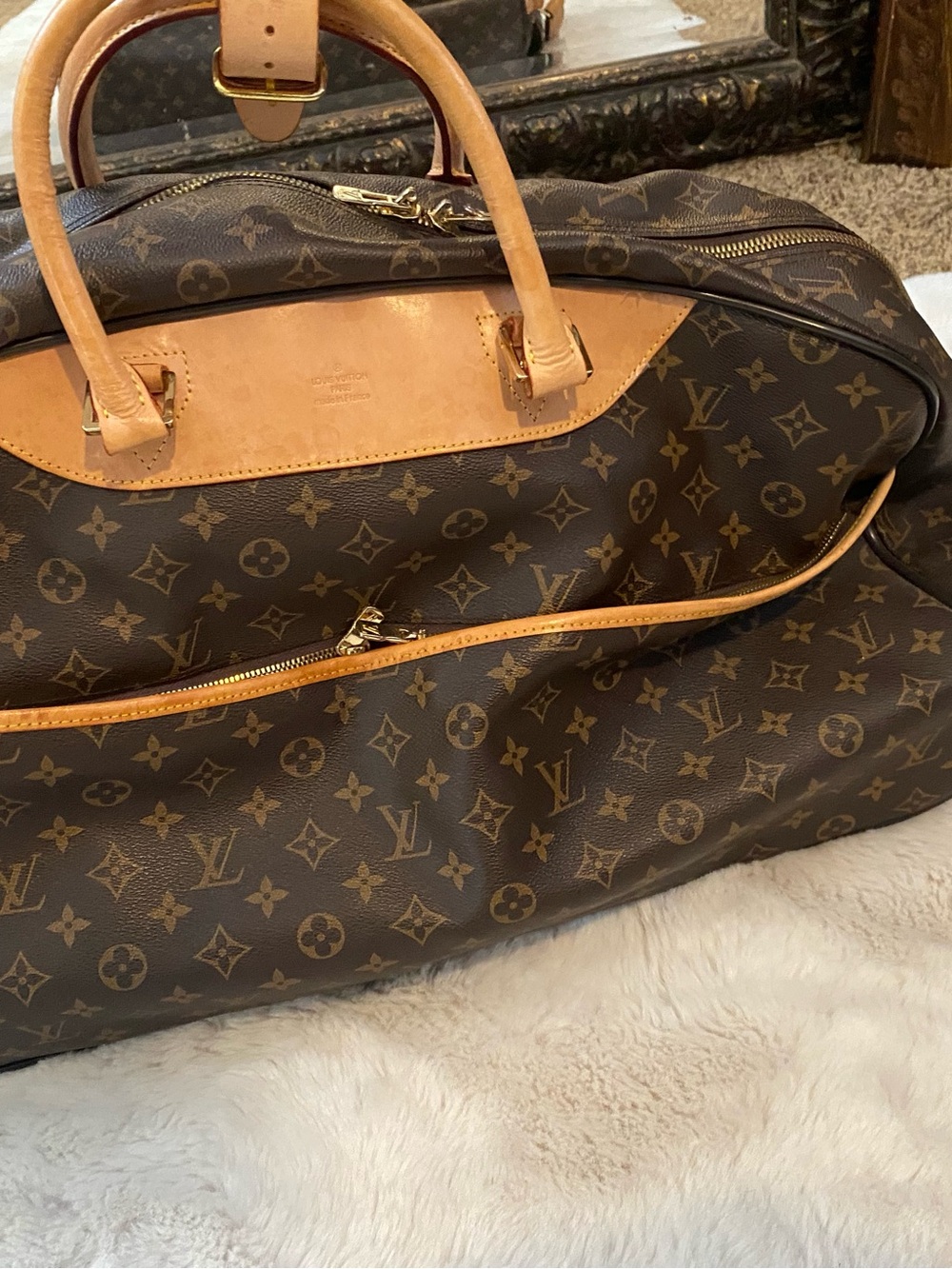 Louis Vuitton Monogram Canvas rolling Travel Bag with Natural Vachetta Trim